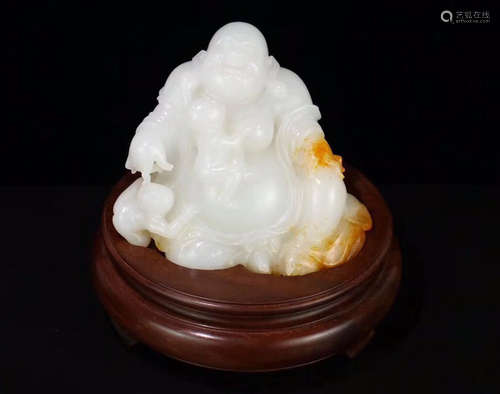 A HETIAN JADE CARVED BUDDHA