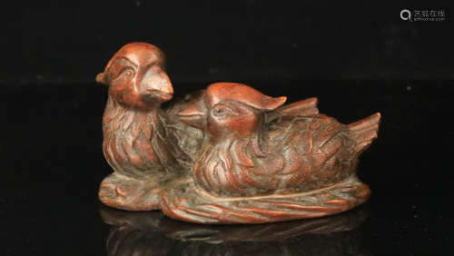 A CHENXIANG WOOD CARVED MANDARIN DUCK SHAPED PENDANT
