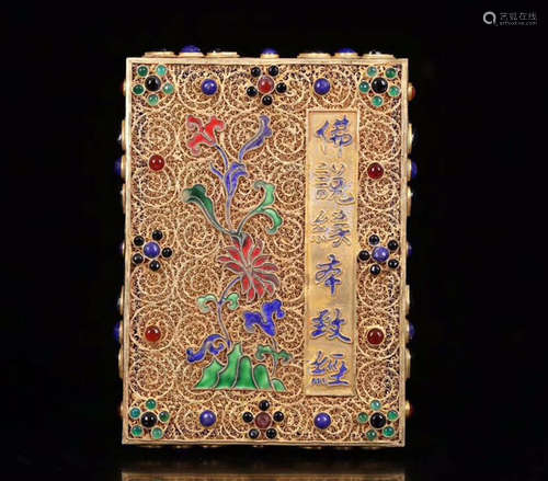 A GILT SILVER GEN DECORATED BUDDHIST SCRIPTURES