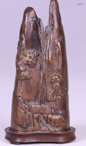 A CHENXIANG WOOD CARVED MOUNTAIN SHAPED PENDANT