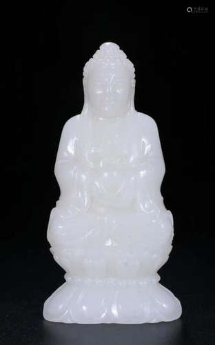 A HETIAN JADE CARVED RULAI BUDDHA