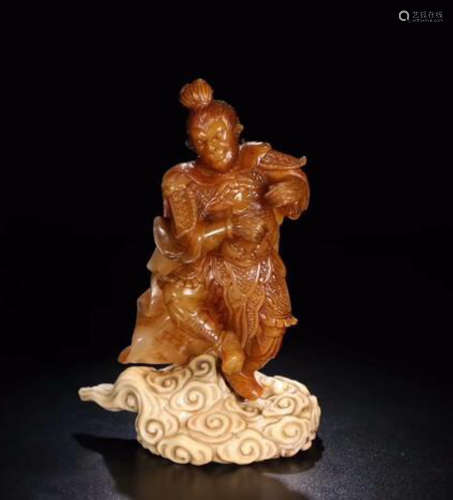 A TIANHUANG STONE CARVED MONKEY SHAPED PENDANT
