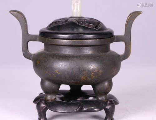 A BRONZE CASTED DOUBLE EAR TRIPOD CENSER