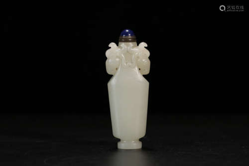 A HETIAN JADE CARVED DOUBLE EAR SNUFF BOTTLE