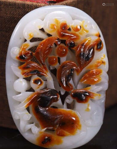 A HETIAN JADE CARVED AUSPICIOUS PATTERN BUTTON