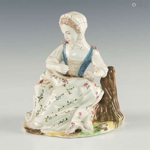 EARLY STAFFORDSHIRE FIGURE OF SEATED LADY IN DRESS