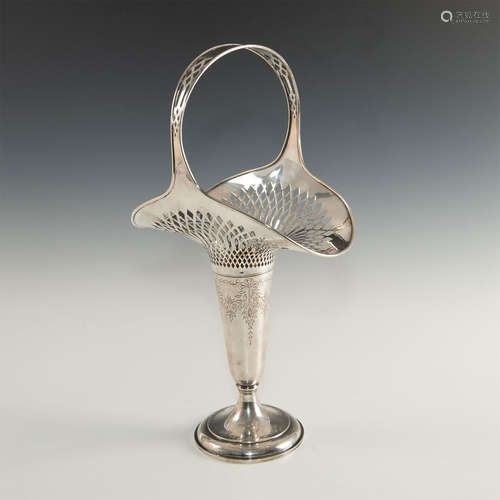 A TALL HANDLED GORHAM STERLING FLOWER BASKET