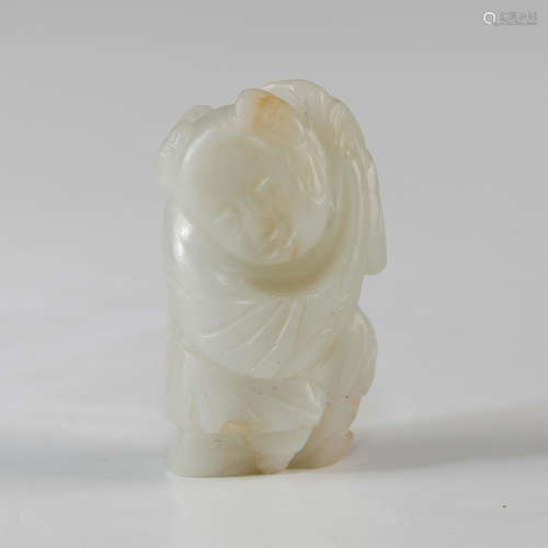 WHITE JADE CARVED BOY WITH YELLOW ROSETTE