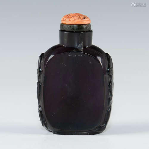 CHINESE CARVED SNUFF BOTTLE WITH CARVED CORAL STOPPER