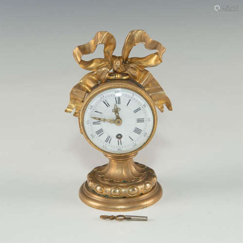 MID-19TH CENTURY SMALL BRONZE MANTLE CLOCK