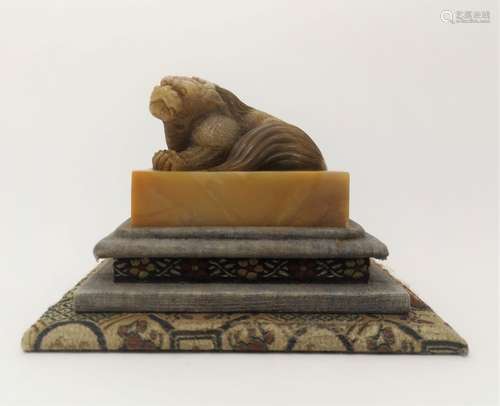 A TIAN HUANG STONE SEAL WITH CHARACTERS (LION)