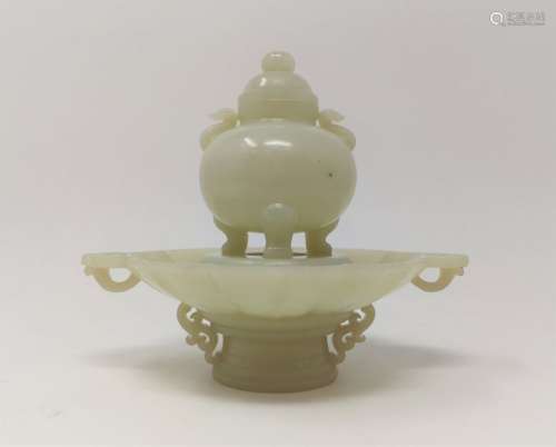 A JADE INCENSE BURNER WITH A STAND