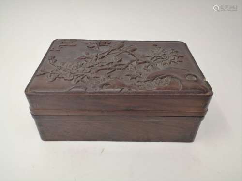A HARD WOOD BOX WITH DETAILED FLOWER AND BIRD CARVING