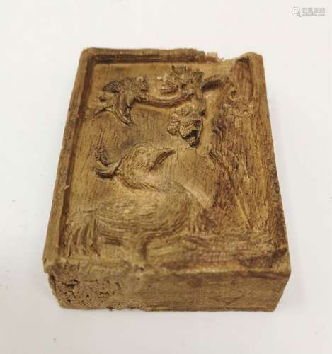 A CARVED AGARWOOD PLAQUE