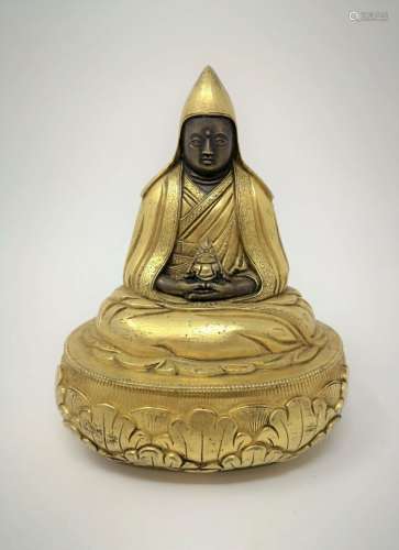 A GILT BUDDHIST STATUE