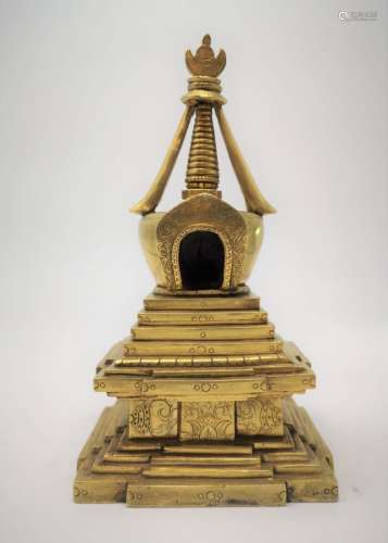 A GILT BUDDHIST TOWER FOR RELICS