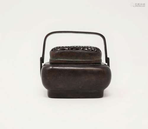 A SMALL BRONZE HAND-WARMER WITH “ZHANG MING QI” SEAL