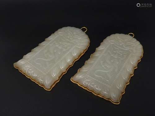 A PAIR OF LARGE PLAQUES, HE-TIAN JADE AND GILT SILVER