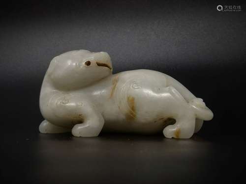 AN AUSPICIOUS BEAST SHAPE JADE WASHER