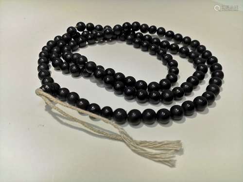 A CHAIN MADE OF 108 HORN BEADS