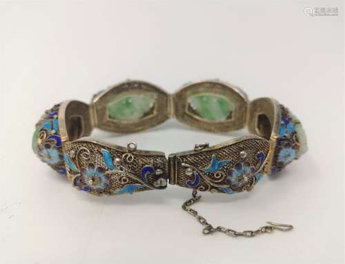 A GILT SILVER BRACELET WITH GREEN JADITE PIECES