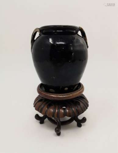 A SMALL BLACK GLAZED JAR (HAN DYN)