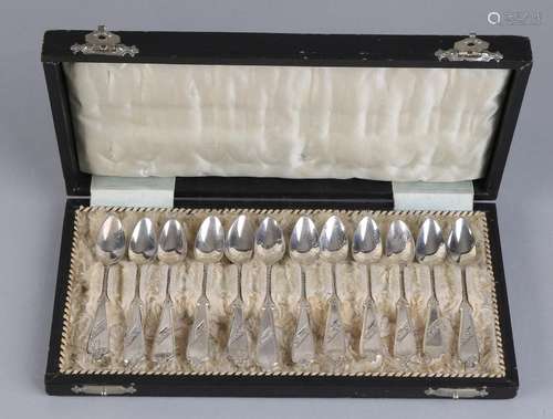 Cassette with 12 silver spoons, 835/000, with point