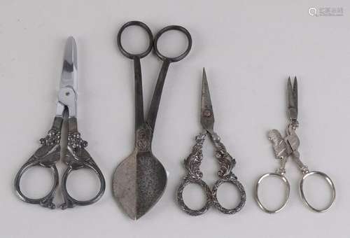 Lot with four antique scissors, various scissors with a