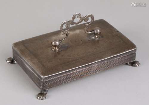 Silver spoon box, 833/000, with ribbed edges, placed on
