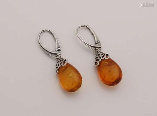 Silver earrings, 835/000, with pear-shaped amber. 4 cm.