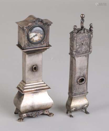 Two silver standing miniature clocks, 833/000, standing