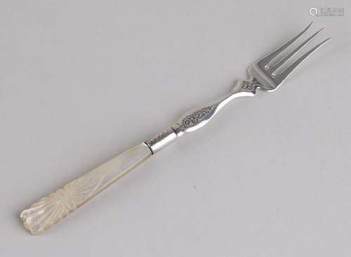 Antique 835/000 silver fork with floral engravings.