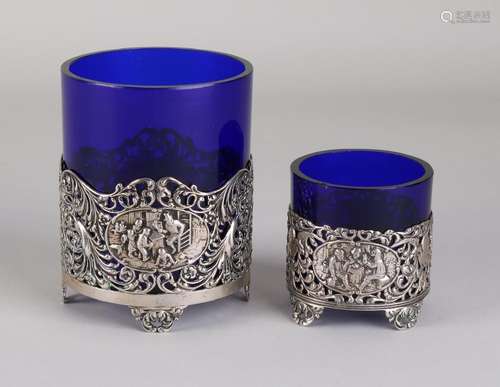 Two silver holders, 833/000, with blue glass.