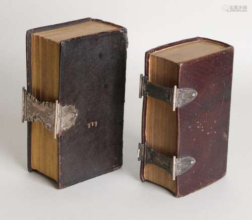 Two bibles with silver locks, 833/000, a bible with