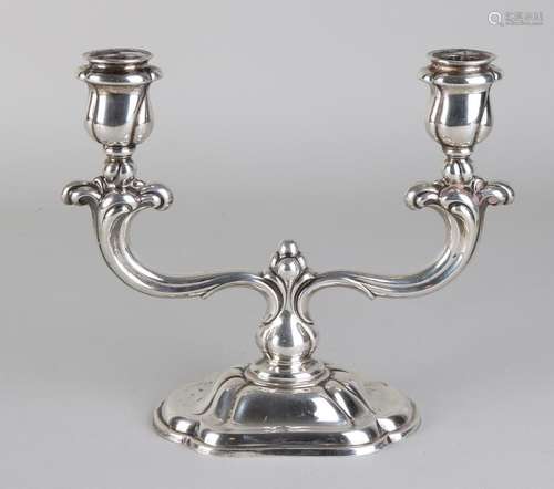 Silver candlestick, 830/000, on a contoured rectangular