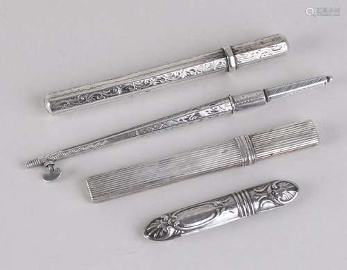 Four parts of silver with 3 needle sleeves and an awl,