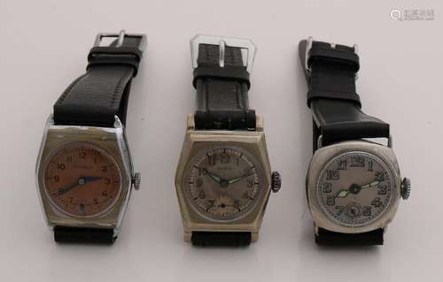 Three steel ladies watches with black leather strap.