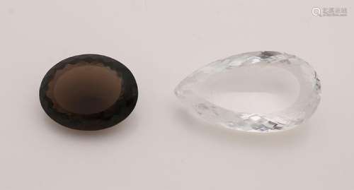 Large quartz and smoky quartz, pear-shaped faceted