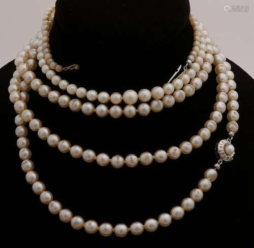 Two pearl necklace. A gradient necklace of cultured