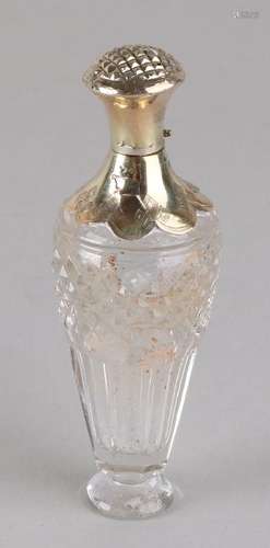 Crystal lodderein bottle with diamond-shaped cut on a