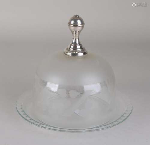 Antique cut and frosted crystal cheese jar on a saucer.
