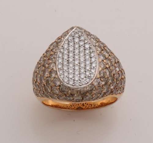 Wide gold ring, 750/000, with diamonds. Convex ring