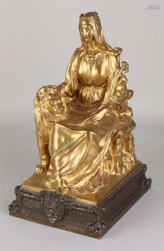 Antique gilt brass statue. Art Nouveau. Woman with lion