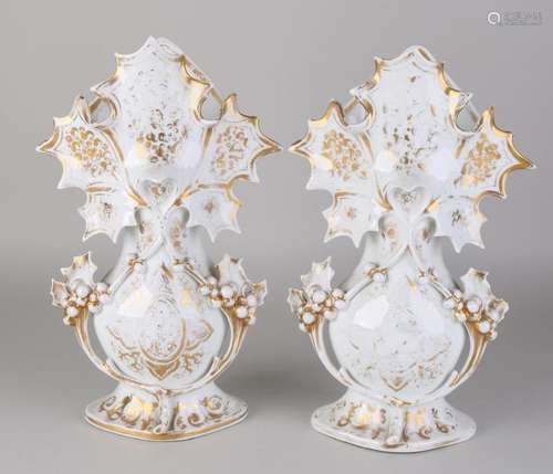 Two 19th century French porcelain vases with gold