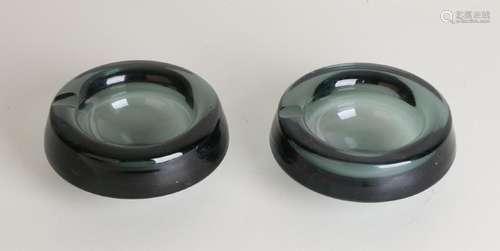 Two old Copier Leerdam green-glass ashtrays. 50s. Size: