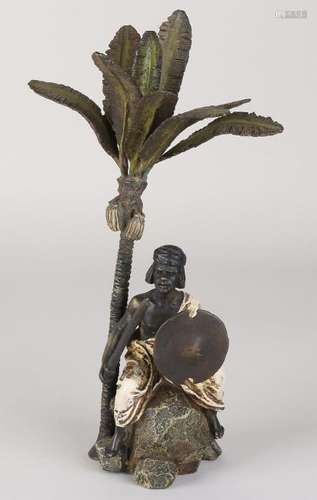 Large bronze figure in Viennese style. Arab under palm.