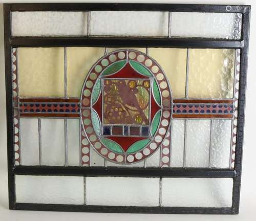 Large old / antique stained glass window. With bird