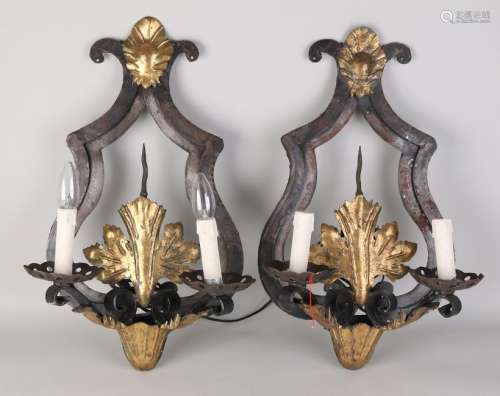 Two old wrought iron wall lamps in Baroque style. 20th