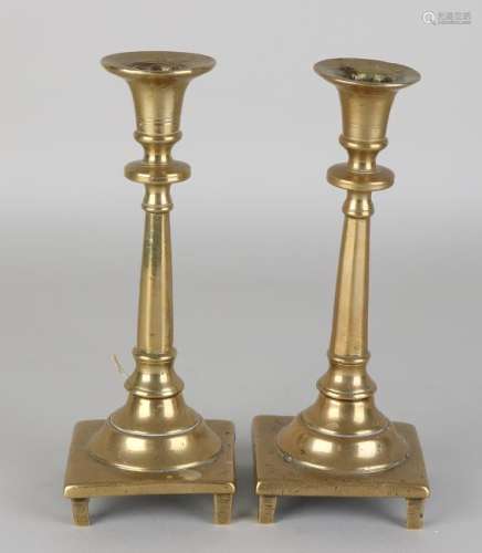 Two threaded 17th - 18th century bronze candle holders.