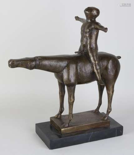 Bronze statue. Naked man on horse, with black marble